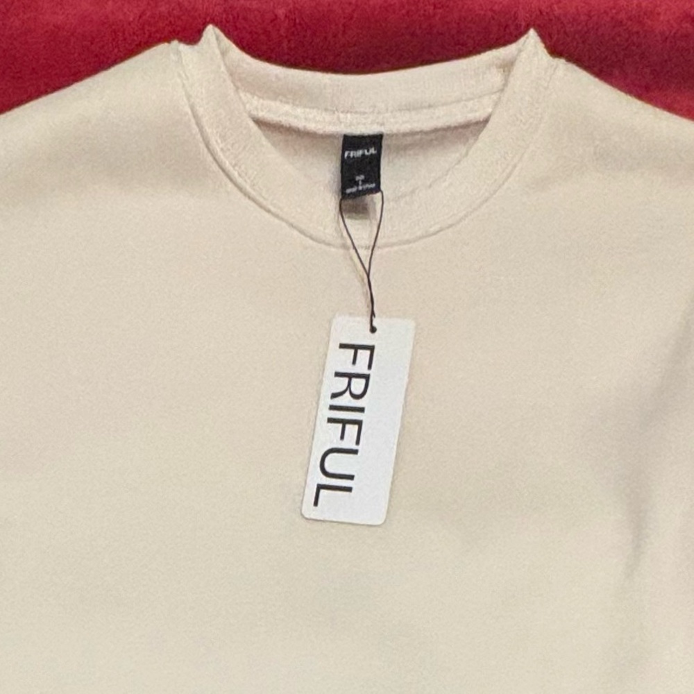 Friful sweater with skirt attached new never been worn with tag, small